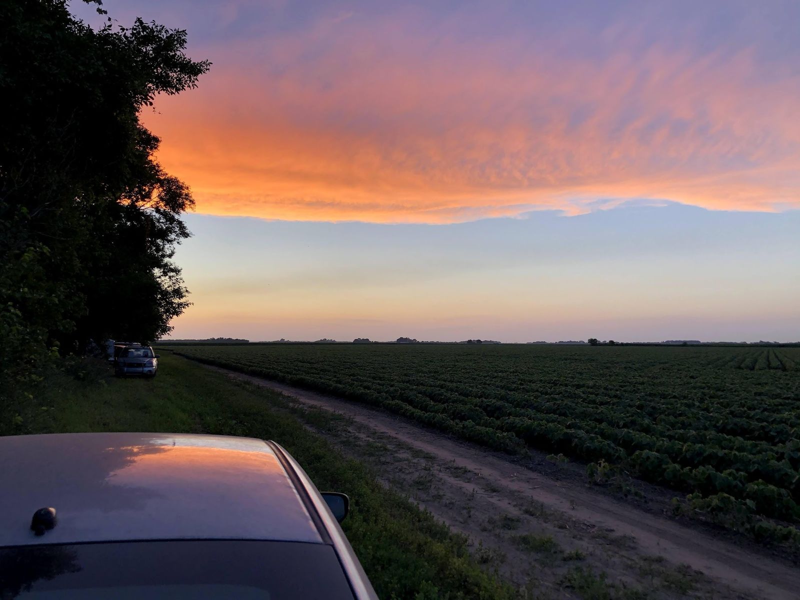 Sunset over the fields at the end of a workday